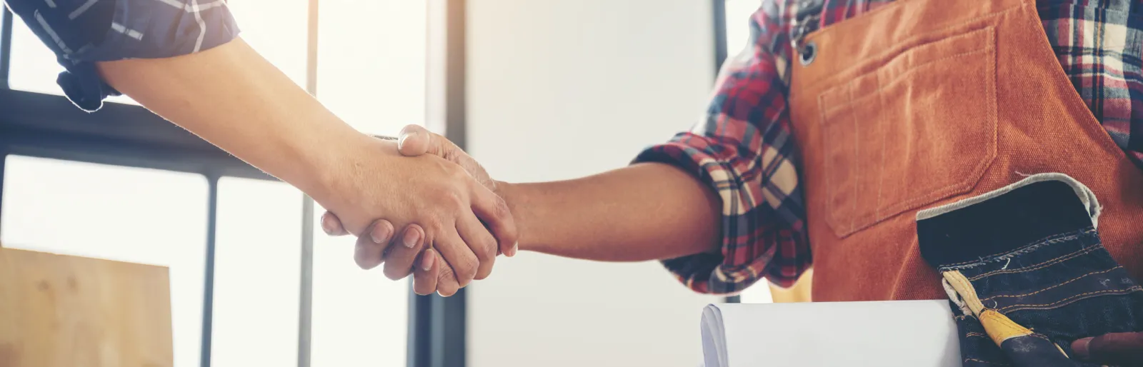 Projul team shaking hands, built by contractors for contractors